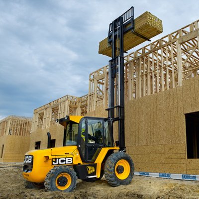 Forklift unloading machinery and industrial equipment in Gravesend